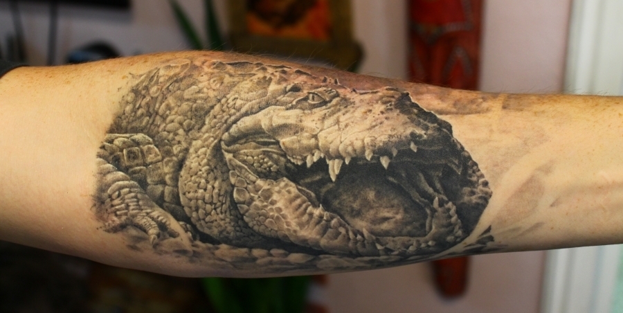 Black And Grey Alligator Tattoo On Left Forearm