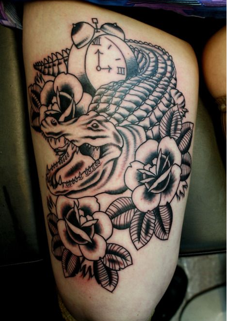 Black Ink Alligator With Clock And Roses Tattoo On Right Thigh