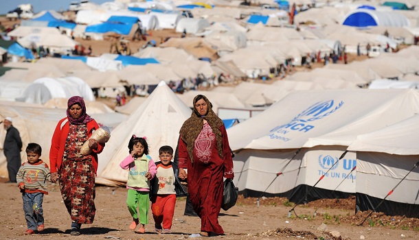 Homeless Refugees Walking On Road - World Refugee Day