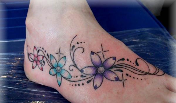 Amazing Flower Star Tattoos On Right Foot