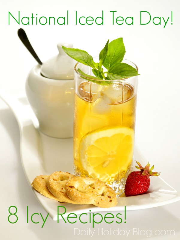 Cold black tea  with lemon, ice and water drops on the glass surface