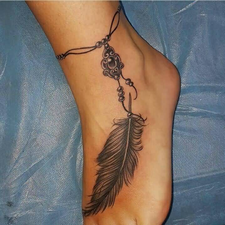 Feather Tattoo With Charm On Ankle Foot