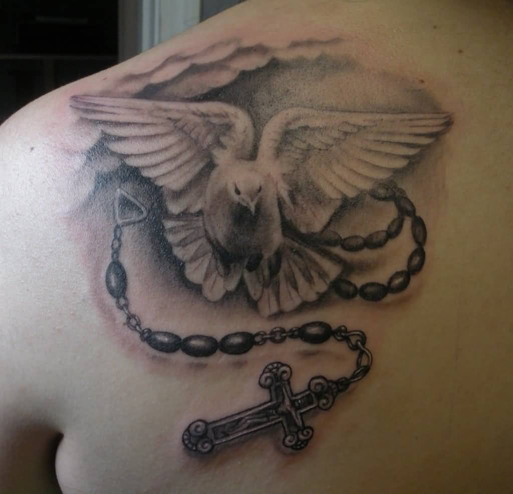 Gray dove with Rosary And cross tattoo