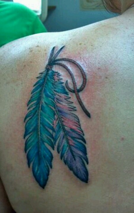 Two Green Feathers Tattoo On Girls Back Shoulder