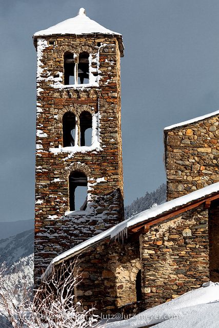 Bell Tower of Sant Joan de Caselles Church With Snow