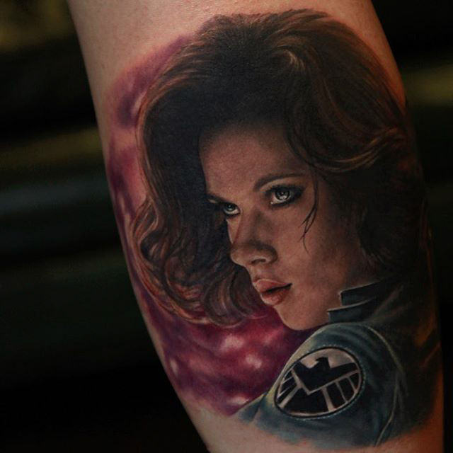 Colored Black Widow avengers tattoo on body by Rich Pineda