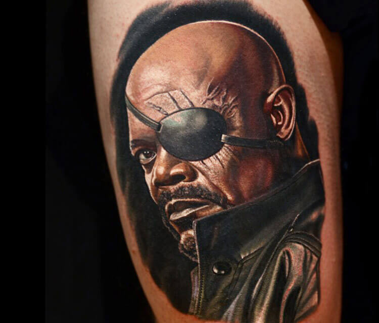 Colored Nick Fury from avengers tattoo on arm by Nikko Hurtado