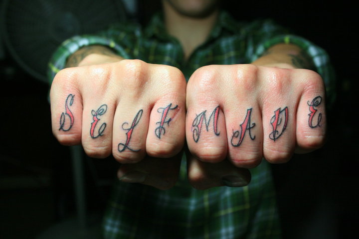 Black and red self made wording knuckle tattoo