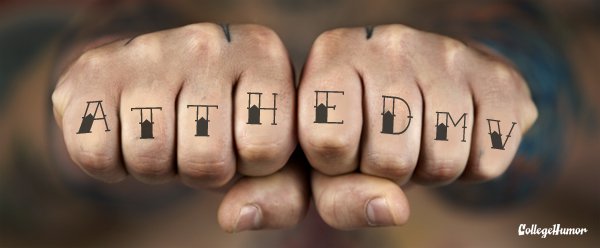 Black Atthedmy wording knuckle tattoo