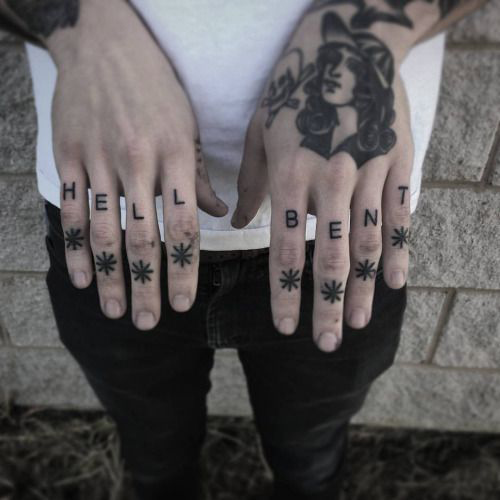 Black hell bent wording knuckle tattoo