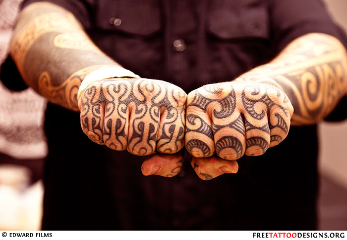 Black knuckle tattoo design by maori