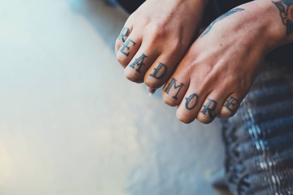 Black read more knuckle tattoo