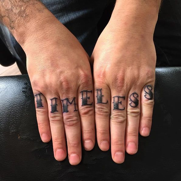 Black timeless wording knuckle tattoo for men