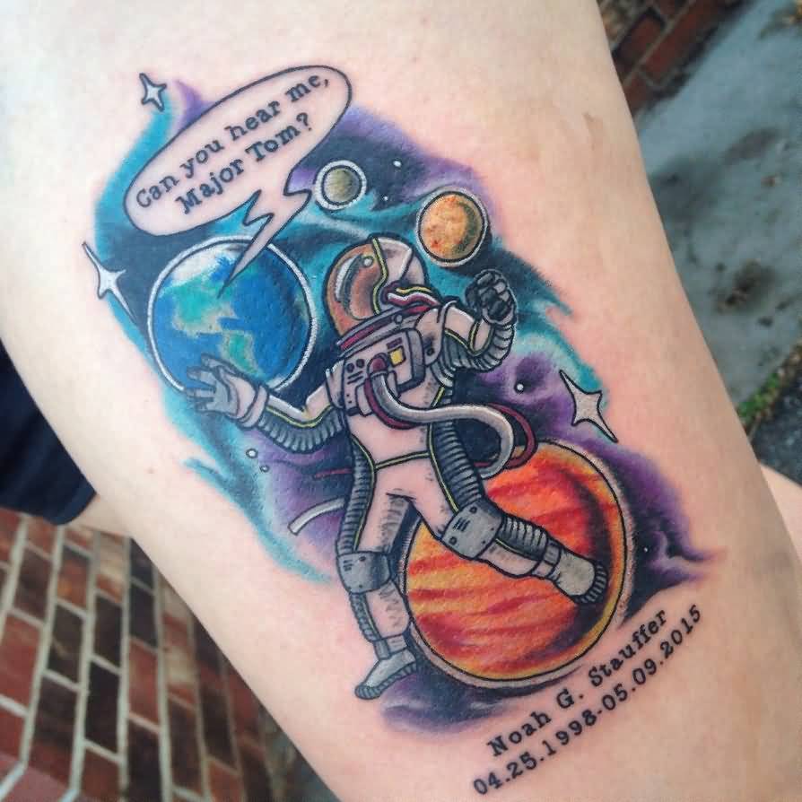 Colored astronaut with universe tattoo on arm by daggerss daqvoat