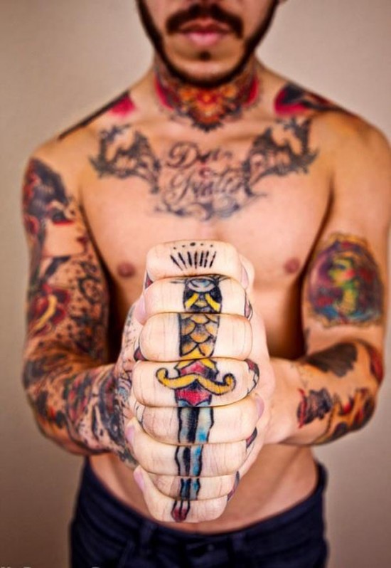 Colorful dagger knuckle tattoo for men