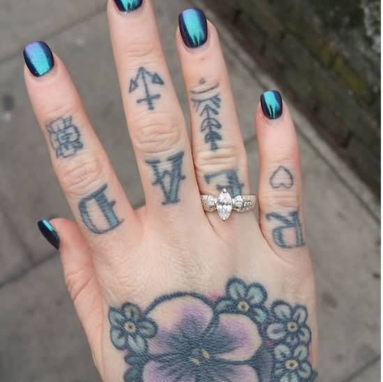 Grey shaded rare knuckle tattoo for women