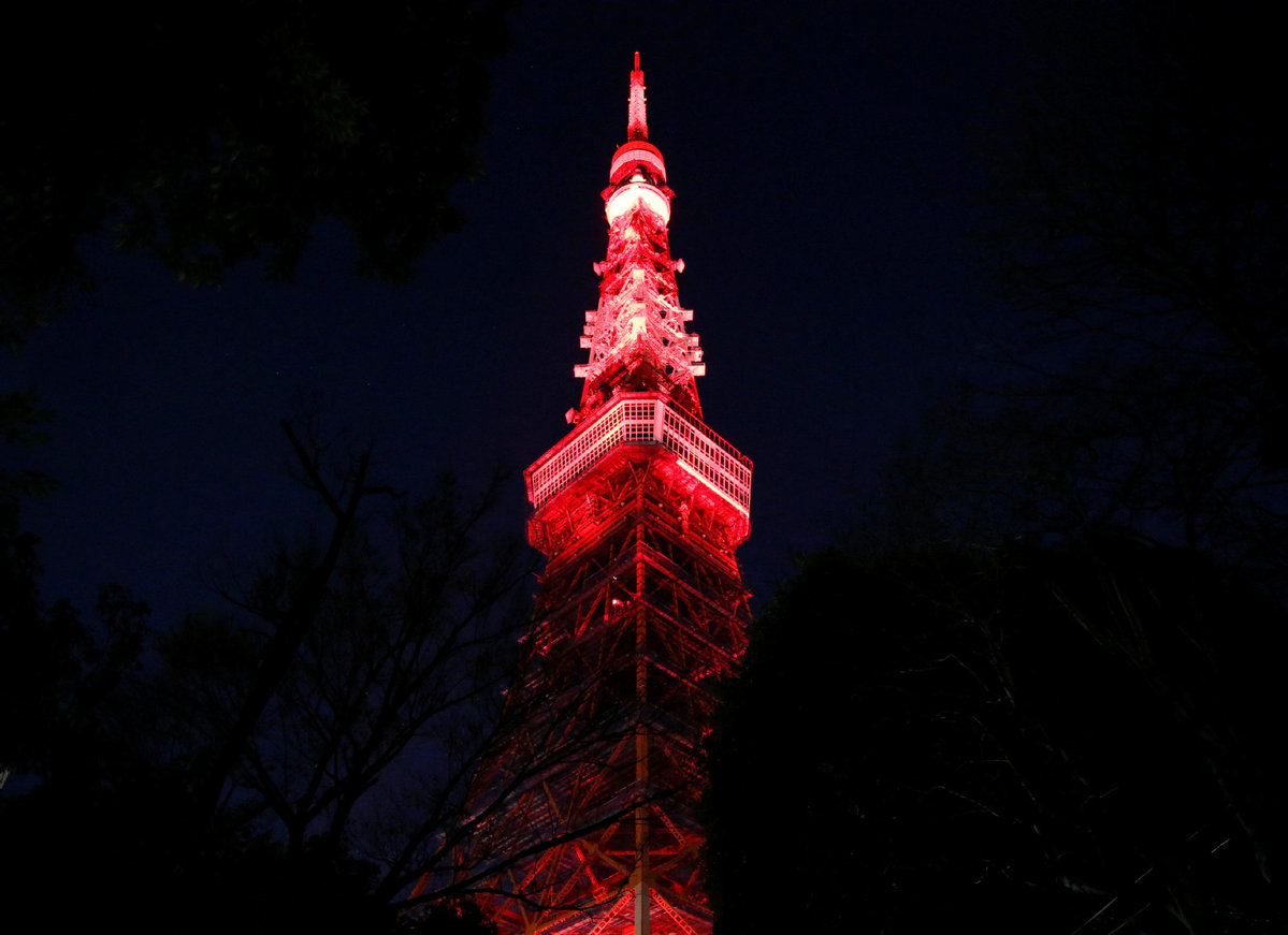 Tokyo Tower is illuminated in red