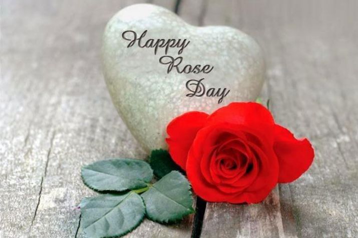 happy rose day heart stone with rose